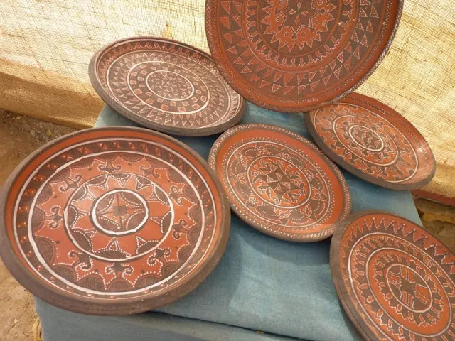 Potter shaping clay by hand without a mould in Kutch Gujarat